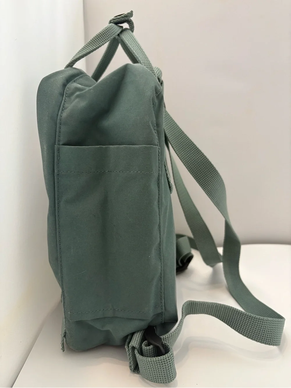 Fjallraven Kanken Mini Backpack in Sage Green with Red Logo